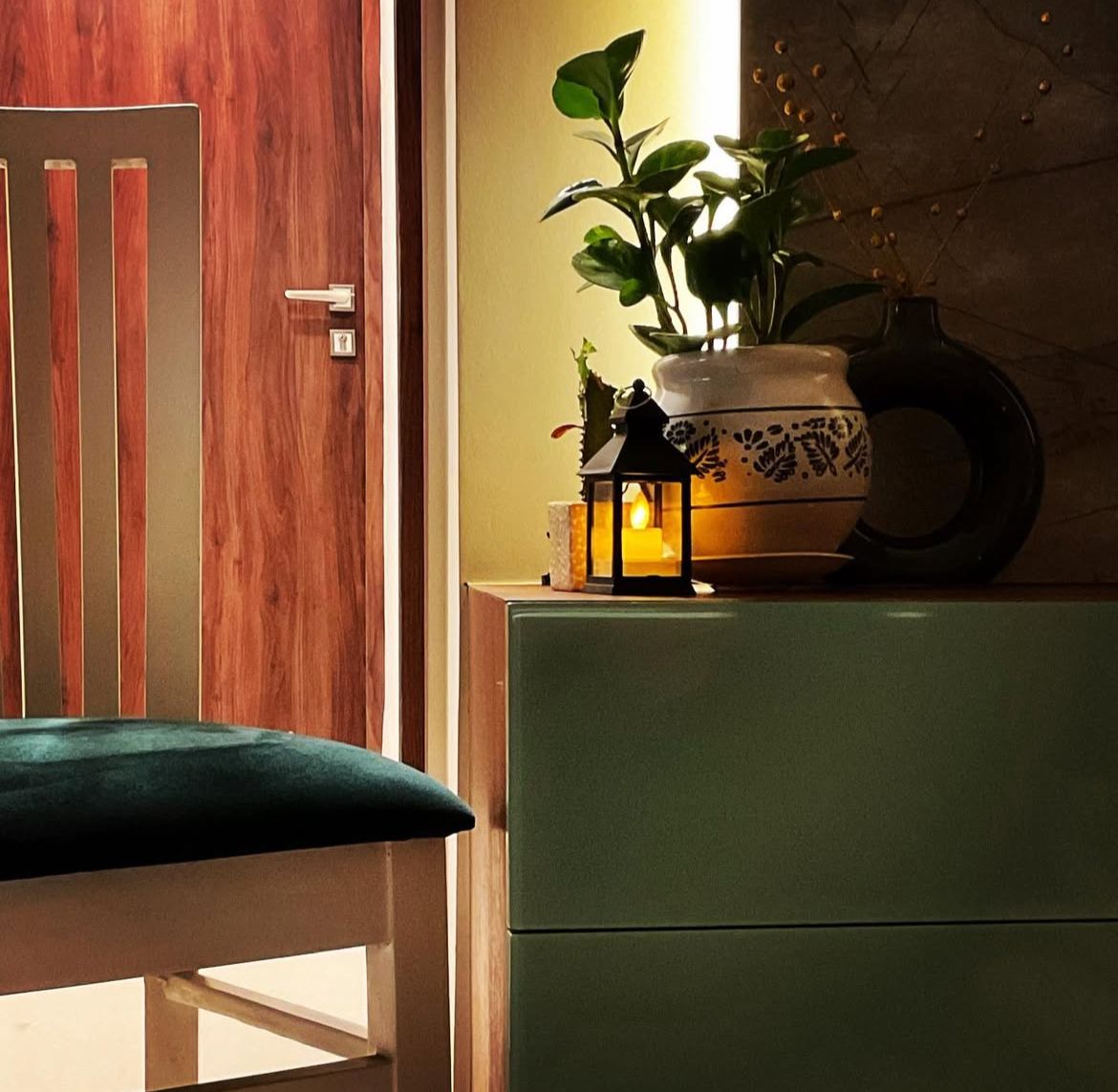 Elegant interior with wooden door and decorative elements